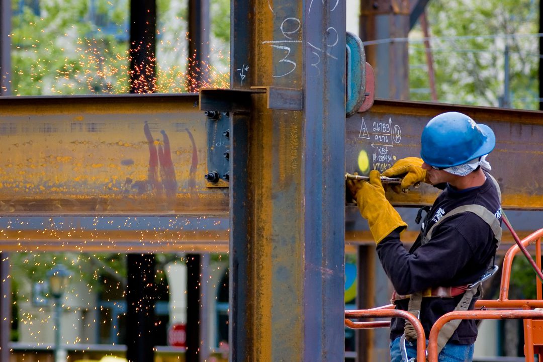 A construction worker welding